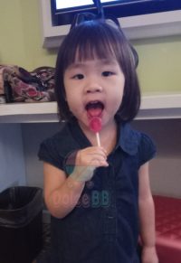 Kid eating Zollipop